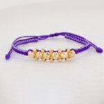 Pulsera De Oro 18k Macramé Con 6 Esfera 6mm Diamantada, Hilo Morado 0,6gr. Largo 19cm