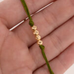 Pulsera Oro 18K Con 4 Esferas Diamantadas 4mm Tejida Con Hilo Verde - Image 3
