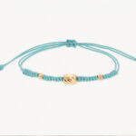 Pulsera De Oro Con Cilindros 5X7 Y Esferas 3mm Diamantadas Hilo Celeste