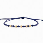 Pulsera De Oro 5 esferas 3mm diamantadas hilo azul